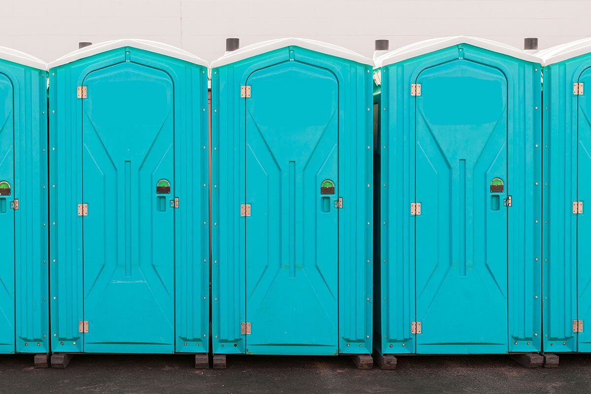 Industrial portable restroom units at a plant in Pittsfield, Massachusetts